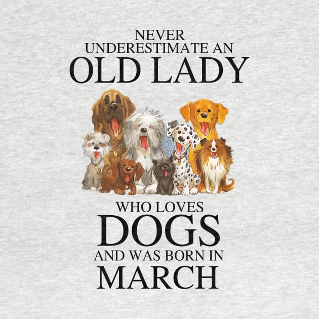 Never Underestimate An Old Lady Who Loves Dogs And Was Born In March by louismcfarland